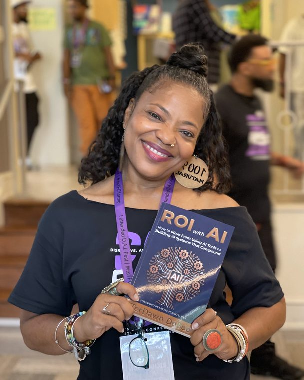 Reader holding a pre-sale copy of ROI with AI