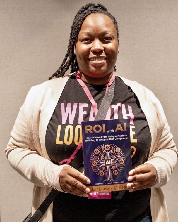Reader holding a pre-sale copy of ROI with AI